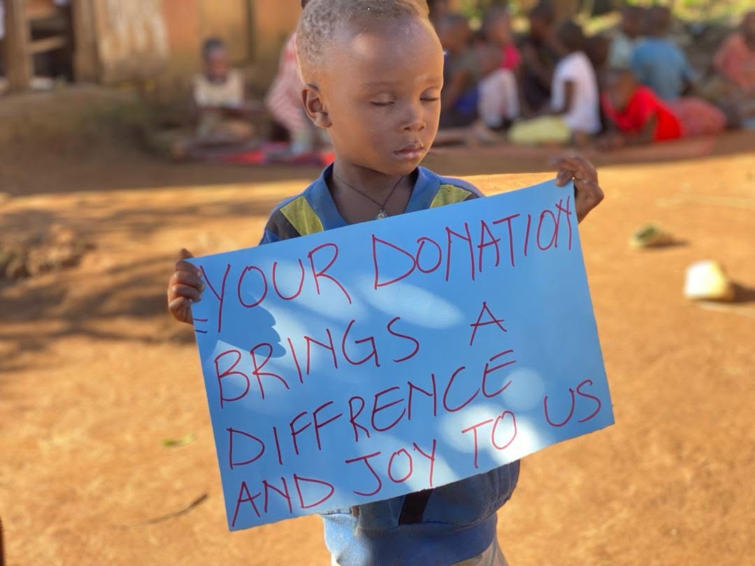 Children showing impact of donations